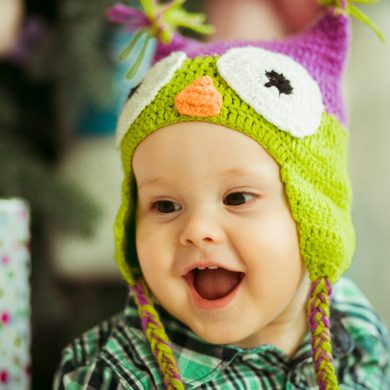 Pretty little boy in hat with eyes